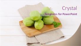  Presentation with kiwi - Theme having pile of peeled kiwi on wooden cutting board background and a sky blue colored foreground