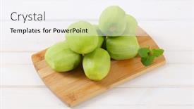  Presentation with kiwi - PPT theme consisting of pile of peeled kiwi on wooden cutting board background and a sky blue colored foreground