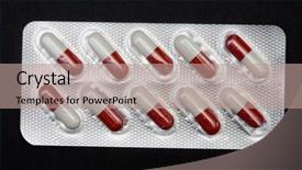  Presentation with plastic container - Presentation theme with pills in plastic container on a black background background and a coral colored foreground