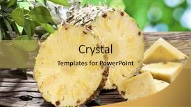  Presentation with green foliage - Cool new slide deck with pineapple with slices on a wooden table with green foliage on the background backdrop and a yellow colored foreground