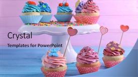  Presentation with cupcakes - Audience pleasing PPT layouts consisting of pink blue butterly - tasty bright cupcakes on color backdrop and a light blue colored foreground