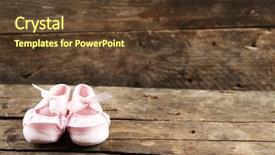  Presentation with shoes - Presentation design with toddler shoes on wooden background background and a tawny brown colored foreground