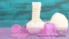  Presentation with tropical flowers - Audience pleasing presentation consisting of pink tropical orchid flowers and massage bags on color wooden background backdrop and a lemonade colored foreground