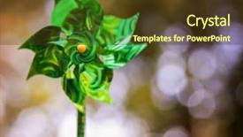  Presentation with pinwheel - Theme with pinwheel spinning in the wind with bokeh in the background background and a tawny brown colored foreground