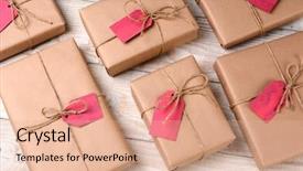  Presentation with christmas presents - Presentation theme having plain brown paper wrapped christmas background and a lemonade colored foreground
