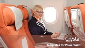  Presentation with laptop - Cool new presentation theme with plane in ecomomy class backdrop and a tawny brown colored foreground