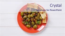  Presentation with green plate - Theme enhanced with plate of marinated green olives with toasts on white wooden background background and a sky blue colored foreground