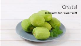  Presentation with kiwi - PPT layouts consisting of plate of peeled kiwi on white background background and a white colored foreground