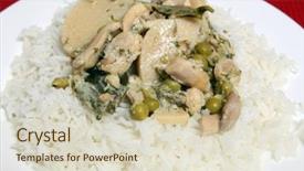  Presentation with curry leaves - Cool new presentation with plate of thai green curry with chicken bamboo shoots kaffir lime leaves chopped coriander cilantro and peas in a coconut milk curry sauce served with basmati rice backdrop and a soft green colored foreground