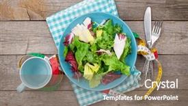  Presentation with tape measure - Audience pleasing theme consisting of plate with fresh salad measure tape cup knife and fork diet food on wooden table backdrop and a violet colored foreground