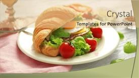  Presentation with croissant - Amazing PPT theme having plate with tasty croissant sandwich on table backdrop and a lemonade colored foreground