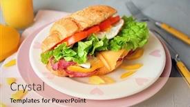  Presentation with croissant - Amazing presentation theme having plate with tasty croissant sandwich on table backdrop and a coral colored foreground