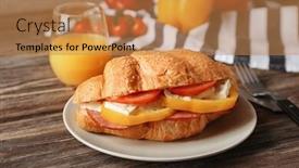  Presentation with croissant - Beautiful presentation theme featuring plate with tasty croissant sandwich on table backdrop and a coral colored foreground