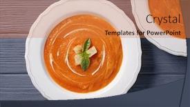 Presentation with soup - Slides with plates with delicious carrot soup on wooden table background and a coral colored foreground