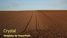  Presentation with springtime - Presentation theme having ploughed field in springtime background and a tawny brown colored foreground
