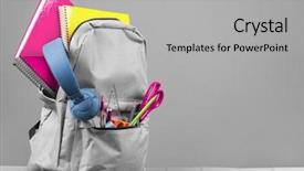  Presentation with grey plastics - Audience pleasing slide deck consisting of pocket calculator - backpack on grey background backdrop and a light gray colored foreground