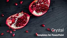  Presentation with pomegranate - Presentation theme with pomegranate-pieces-on-black-background background and a dark gray colored foreground