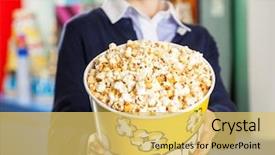 Presentation with worker - Amazing PPT theme having popcorn bucket at cinema concession backdrop and a yellow colored foreground