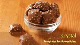  Presentation with chocolate milk - Amazing slide deck having portion of milk chocolate pralines served in a glass bowl backdrop and a tawny brown colored foreground