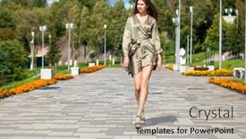  Presentation with beautiful green - Cool new presentation theme with portrait in full growth young beautiful brunette woman in a green dress walking on the street summer embankment outdoors backdrop and a light gray colored foreground
