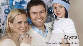  Presentation with portrait happy family smiling - Audience pleasing slide set consisting of portrait of a happy family smiling together with christmas tree in the background backdrop and a mint green colored foreground