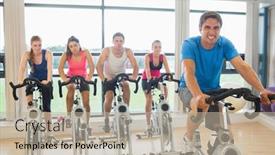  Presentation with exercise bike - Amazing PPT theme having portrait of a happy man teaches exercise bike class to four people at gym backdrop and a mint green colored foreground