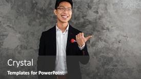  Presentation with space suit - Slide deck consisting of portrait of a happy young asian man dressed in suit pointing finger away at copy space over gray background background and a dark gray colored foreground