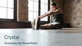 Presentation with stretching - PPT theme enhanced with portrait of a healthy sportsman doing stretching exercises while sitting on the floor at the gym background and a sky blue colored foreground