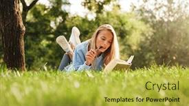  Presentation with taking notes - PPT theme enhanced with portrait of a pensive young girl laying on a grass at the park reading a book taking notes background and a yellow colored foreground
