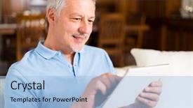  Presentation with using digital tablet - Cool new PPT layouts with portrait of a smiling mature man using a digital tablet in his living room backdrop and a light blue colored foreground