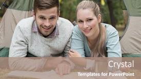  Presentation with wilderness - PPT layouts having portrait of a smiling young couple lying in tent with a map in the wilderness background and a coral colored foreground