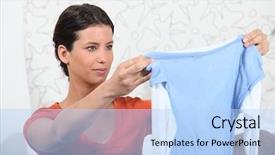  Presentation with garment - Presentation having portrait of a woman folding a garment background and a light blue colored foreground