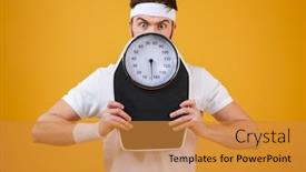  Presentation with weight - Amazing slide set having portrait of a young fitness man hiding behind weight scales and looking at camera isolated on orange background backdrop and a gold colored foreground