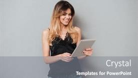  Presentation with computer - PPT theme featuring portrait of a young smiling girl using tablet computer isolated over grey background background and a gray colored foreground