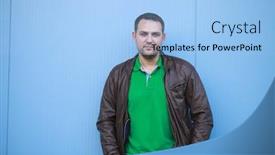  Presentation with brown leather - Audience pleasing presentation theme consisting of portrait of an adult male in a brown leather jacket against a blue wall background backdrop and a light blue colored foreground