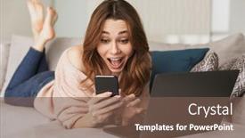  Presentation with mobile home - Cool new slide deck with portrait of an excited young woman using mobile phone while while lying on a couch at home with laptop computer backdrop and a violet colored foreground