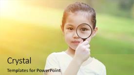  Presentation with child exploring - PPT theme enhanced with portrait of asian child with magnifier glass exploring nature at park little girl having fun outdoors morning sun flare background background and a yellow colored foreground