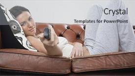  Presentation with remote - Amazing slide deck having portrait of beautiful young woman using remote control while lying on sofa at home backdrop and a light gray colored foreground