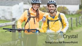  Presentation with mountain bike - Cool new PPT theme with portrait of biker couple with mountain bike in countryside backdrop and a mint green colored foreground