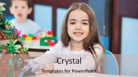  Presentation with preschool - Presentation theme featuring portrait of cute little girl with popup book sitting at desk in preschool background and a soft green colored foreground