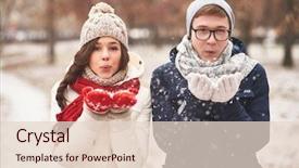  Presentation with snowflakes - Theme enhanced with portrait of cute young dates in casual winterwear blowing snowflakes from palms background and a lemonade colored foreground
