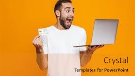  Presentation with credit card - Presentation featuring portrait of ecstatic man 30s in white t-shirt holding silver laptop and credit card isolated over yellow background background and a gold colored foreground