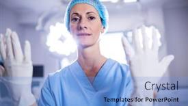  Presentation with operation room - Cool new slide deck with portrait-of-female-surgeon-preparing backdrop and a light blue colored foreground