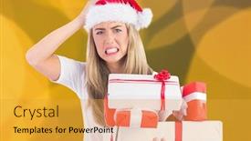  Presentation with santa - PPT theme consisting of portrait of frustrated woman in santa hat holding stack of gifts background and a gold colored foreground
