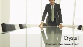  Presentation with conference table - Audience pleasing presentation theme consisting of portrait of happy businessman leaning his hands on conference table backdrop and a mint green colored foreground