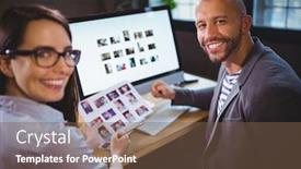  Presentation with coworkers - Audience pleasing PPT theme consisting of portrait of happy coworkers sitting at computer desk in creative office backdrop and a tawny brown colored foreground