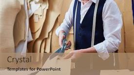  Presentation with old clothes - Theme with portrait of old tailor cutting patterns on fabric while making clothes in atelier shop background and a coral colored foreground