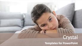  Presentation with sad girl - Beautiful presentation theme featuring portrait of sad little girl laying on couch backdrop and a coral colored foreground