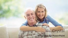  Presentation with senior living - Cool new PPT theme with portrait of senior woman embracing a man in living room at home backdrop and a coral colored foreground