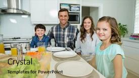  Presentation with dining - Theme with portrait of smiling family having lunch together on dining table at home background and a coral colored foreground